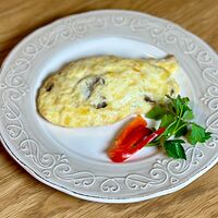 Курица запеченная под соусом с грибами