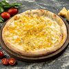 Фото к позиции меню Пицца Четыре сыра на сливочной основе
