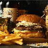 Фото к позиции меню Крафт бургер с голубым сыром и соусом из сливы