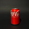 Фото к позиции меню Coca-Cola в баночке