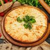 Фото к позиции меню Хачапури с сыром и зеленью