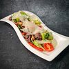 Фото к позиции меню Теплый салат с говядиной и овощами по-испански