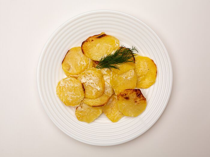 Картофель, запечённый в соусе
