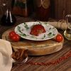 Фото к позиции меню Свинина, запеченная с томатами и сыром