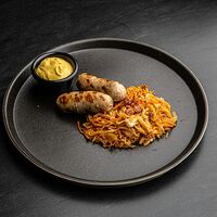 Мюнхенская колбаска с тушёной капустой и дижонской горчицей