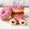 Фото к позиции меню Пончик-Донат с малиновой начинкой и розовой глазурью