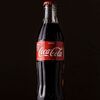 Фото к позиции меню Coca Cola стекло