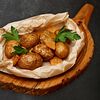 Фото к позиции меню Молодой картофель на мангале с курдюком