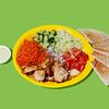 Фото к позиции меню Шаверма на тарелке с обжаренным филе курицы, свежими овощами и морковью по-корейски