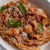 Фото к позиции меню Спагетти с крабом в сливочно-томатном соусе