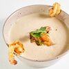 Фото к позиции меню Луковый крем суп Вишеуаз с креветкой