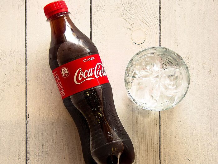 Вода газированная Coca- Cola пл/бут 0,5л