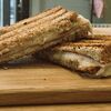 Фото к позиции меню Сэндвич-тост с сыром и ветчиной на хлебе с отрубями