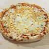 Фото к позиции меню Пицца из дровяной печи Четыре сыра