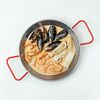 Фото к позиции меню Сковорода с миксом морепродуктов в соусе берблан