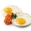 Фото к позиции меню Яичница из двух яиц с помидором