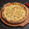 Фото к позиции меню Пицца Четыре сыра итальянская