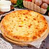 Фото к позиции меню Осетинский пирог с сыром и картофелем Картофджын