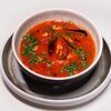 Фото к позиции меню Суп Сицилийский томатный с морепродуктами