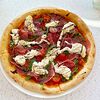 Фото к позиции меню Пицца с Прошутто Крудо и сыром Страчателла