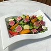 Фото к позиции меню Теплый салат с тунцом