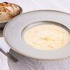 Фото к позиции меню Картофельный крем-суп с пармезаном