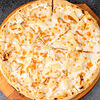 Фото к позиции меню Гавайская пицца с ананасами