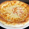 Фото к позиции меню Пицца Сырная на традиционном тесте