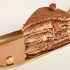 Фото к позиции меню Медовый торт Молочный шоколад-фундук