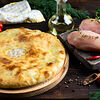 Фото к позиции меню Осетинский пирог с сыром и курицей 30 см