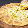 Фото к позиции меню Хачапури с соусом болоньезе и сыром