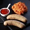 Фото к позиции меню Мюнхенские колбаски с жареной капустой в немецком стиле и соусом на выбор