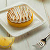 Фото к позиции меню Лимонная тарталетка с меренгой