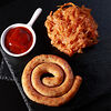 Фото к позиции меню Братвурст колбаска с жареной капустой в немецком стиле и соусом на выбор