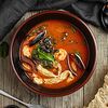 Фото к позиции меню Суп с морепродуктами и черной фасолью