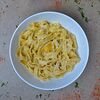 Фото к позиции меню Спагетти с сыром моцарелла в сливочном соусе