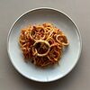 Фото к позиции меню Спагетти с кальмарами в томатном соусе