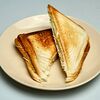 Фото к позиции меню Горячий сэндвич с сыром и грибами
