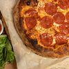 Фото к позиции меню Неаполитанская пицца Пепперони