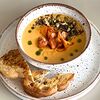 Фото к позиции меню Крем-суп из батата с креветками