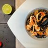 Фото к позиции меню Чёрные спагетти Нери с морепродуктами