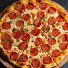 Фото к позиции меню Пицца острая с сервелатом и перцем