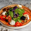 Фото к позиции меню Теплый салат с баклажанами и томатами