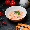 Фото к позиции меню Удон с морепродуктами в сливочном соусе тобико