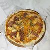 Фото к позиции меню Пицца с грибами и прошутто