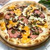 Фото к позиции меню Пицца с беконом, грибами и сыром чеддер