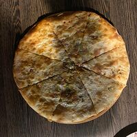 Осетинский пирог с зеленью и с сыром