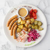Фото к позиции меню Колбаски мюнхенские с печеным картофелем, маринованным луком и беконом