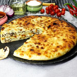 Пирог осетинский с курицей и сыром