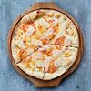 Фото к позиции меню Пицца Четыре сыра с помидорами 32см